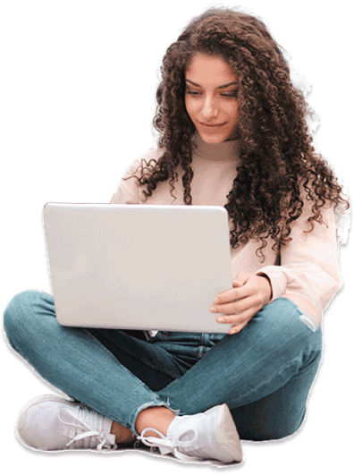 young woman sitting holding laptop