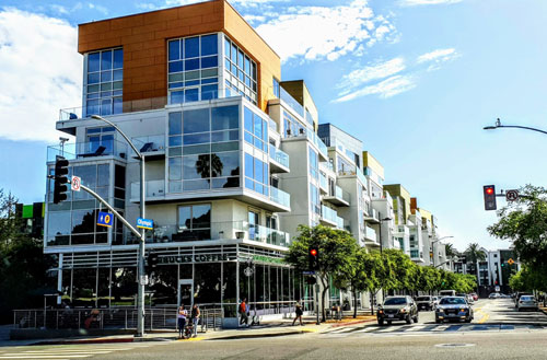 tall modern buildings and a city intersection