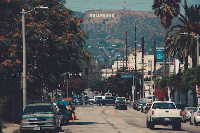 city street with Hollywood sign in distance