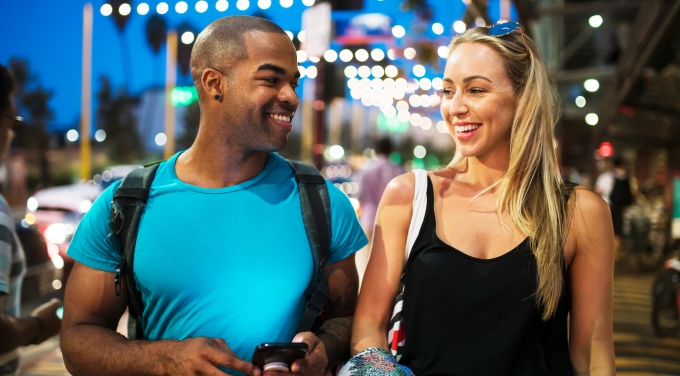 man and woman smiling