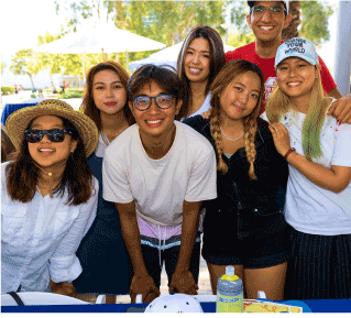 a group of smiling students pose for a photo